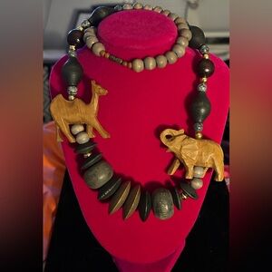 Exotic wood hand carved animal necklace. Rare 1980’s